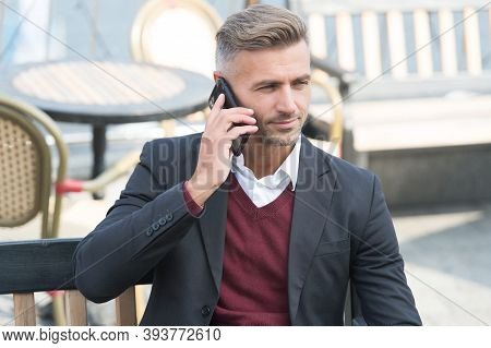 Youre Never Alone With Cellphone. Businessman Make Phone Call Outdoors. Call Answering. Phone Conver