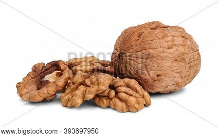 Close Up Of Hard Walnut And Heap Of Walnut Kernels, Isolated On White Background.