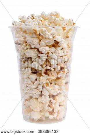 Delicious Popcorn In Transparent Plastic Cup Isolated On White Background.