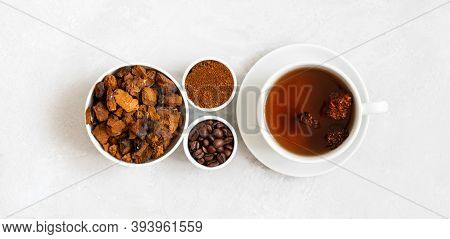Chaga Mushroom Drink With Coffee And Chopped Chaga Pieces On A White Background. New Superfood Trend