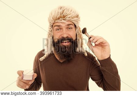 Freak Visagiste. Applying Makeup Face Tone. Powder Cosmetics. Man Bearded Fashion Stylist Wear Hat H