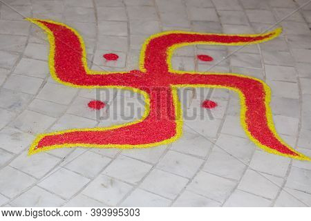 A Hindu Religion Swastik Sign Red Rangoli