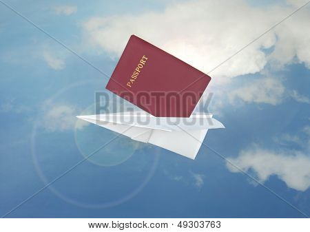 Passeport et vol avion papier bleu
