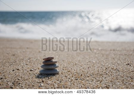 Stack Of Pebble Stones On The Beach
