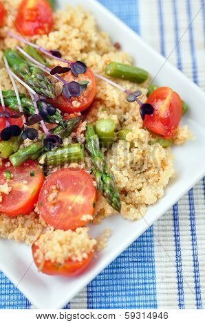 Healthy Couscous Salad with tomatoes and green asparagus