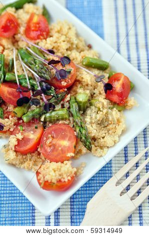 Healthy Couscous Salad with tomatoes and green asparagus