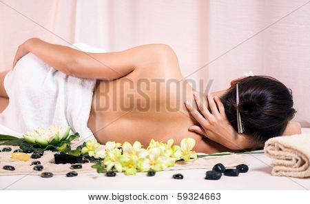 Young woman enjoying at spa salon