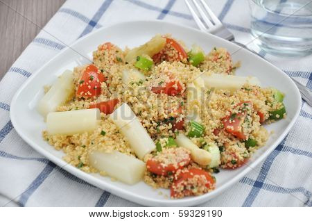 Couscous Salad with tomatoes, peas and asparagus