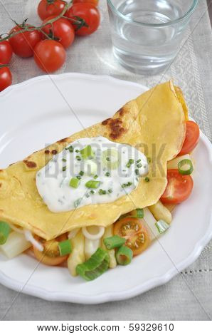Pancakes filled with Asparagus and fresh vegetables.