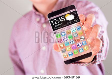 Smartphone (phablet) with a transparent display in human hands. Concept actual future innovative ideas and best technologies humanity.