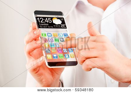 Smartphone (phablet) with a transparent display in human hands. Concept actual future innovative ideas and best technologies humanity.