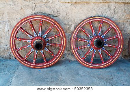 Wagon Wheel . Close-up Of An Antique Wagon Wheel Located In A Fortress.