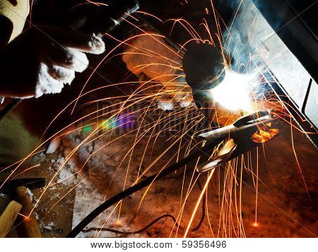 Welding Car Turnbuckle In Snow Field