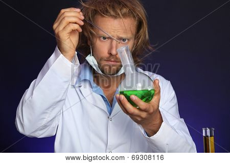 Crazy scientist working in laboratory