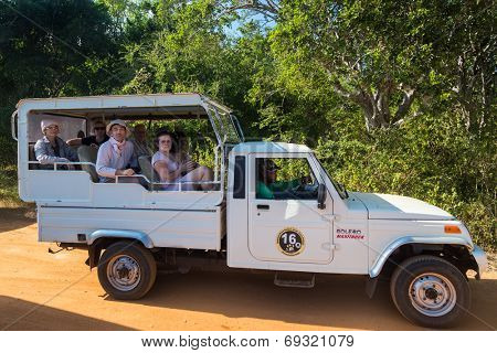 YALA NATIONAL PARK, SRI LANKA - MARCH 4, 2014: Safari jeep tour in the Yala park. Yala is the second largest national park in Sri Lanka.