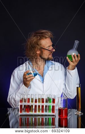 Crazy scientist working in laboratory