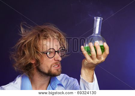Crazy scientist working in laboratory