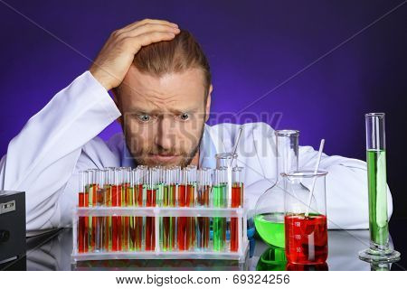 Crazy scientist working in laboratory