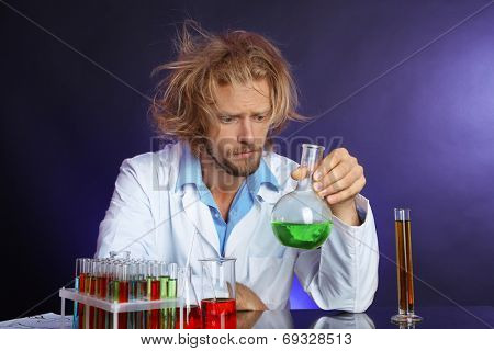Crazy scientist working in laboratory