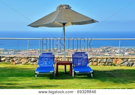 Lounge Chairs By The Pool