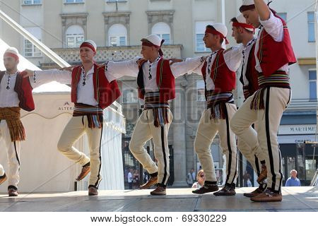 Members of folk group Albanian Culture Society Jahi Hasani from Cegrane, Macedonia during the 48th International Folklore Festival in center of Zagreb,Croatia on July 20,2014