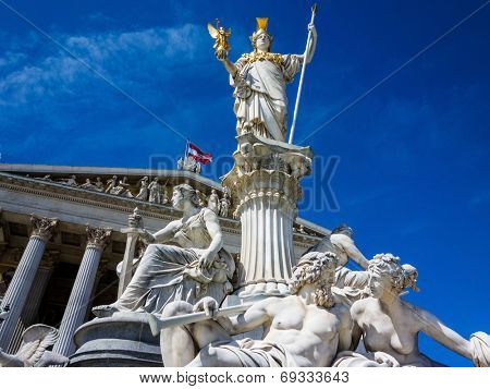 the parliament in vienna, austria. with the statue of 
