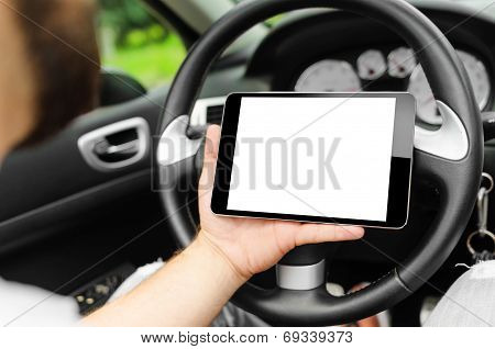 Car Driver With The Tablet Pc