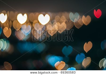 Blur image, love or heart shape bokeh of light