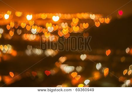 Blur image, love or heart shape bokeh of light