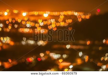 Blur image, love or heart shape bokeh of light