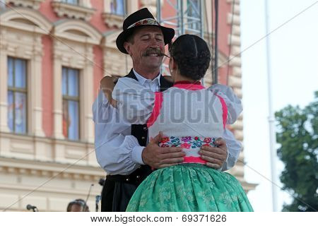 ZAGREB, CROATIA - JULY 19: Members of folk groups Nograd  from Salgotarjan, Hungary during the 48th International Folklore Festival in center of Zagreb, Croatia on July 19, 2014