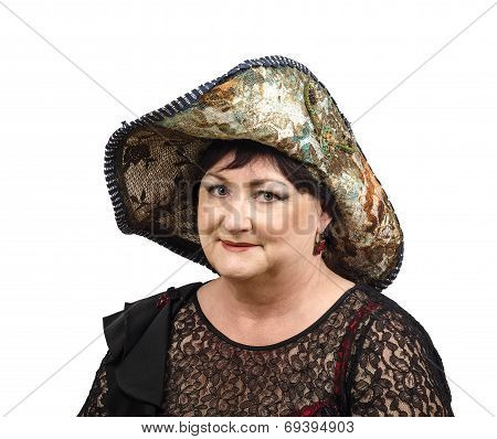 Mature Woman In Tapestry Hat Looking At Camera