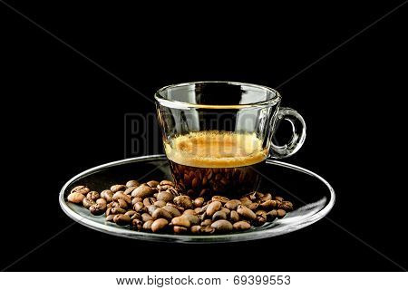 espresso coffee in glass cup with roasted coffee beans