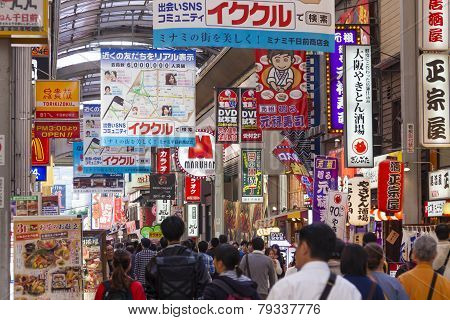 People Visiting A Shopping Street In Osaka, Japan.