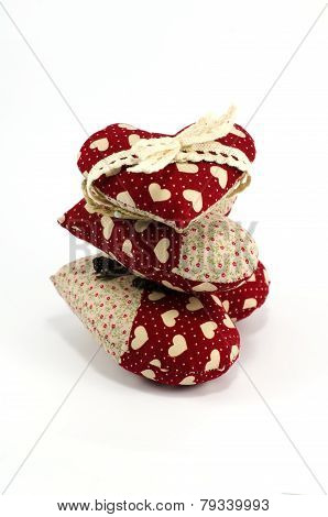 Three pillows as hearts