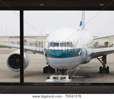 Cathay Pacific Passenger Airplane At The Airport