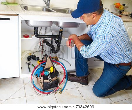 Plumber On The Kitchen.