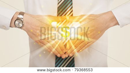 Hands creating a form with shining dollar sign in the center 