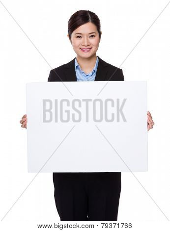 Businesswoman with palcard