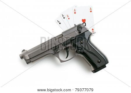 handgun and poker cards on white background