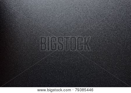 Black Abstract Textured Background with Spotlight
