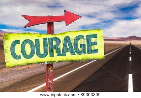 Courage sign with road background