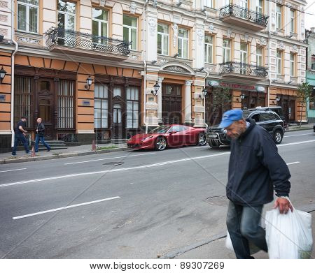 Ukraine, Kiev - September 9, 2013: Expensive Supercars And Poor Side By Side On The Streets