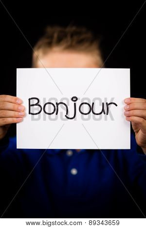 Child Holding Sign With French Word Bonjour - Hello