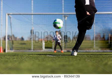 Soccer Player And Goalie During Penalty Shootout