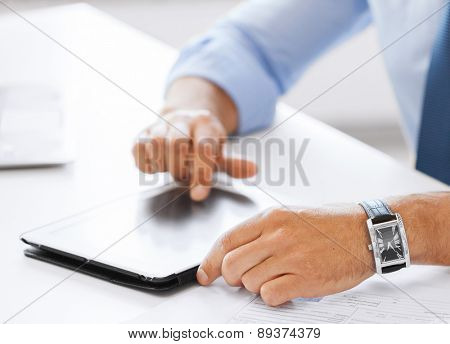 business, office, school and education concept - businessman with tablet pc in office