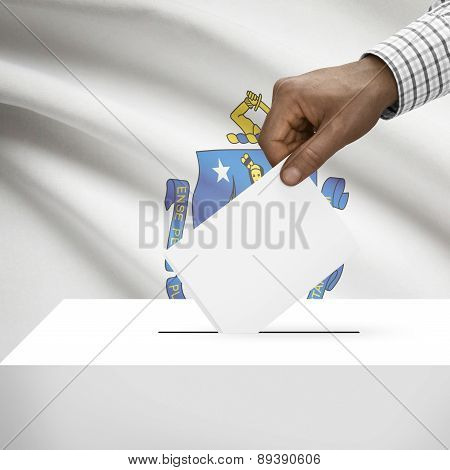 Voting Concept - Ballot Box With Us State Flag On Background - Massachusetts