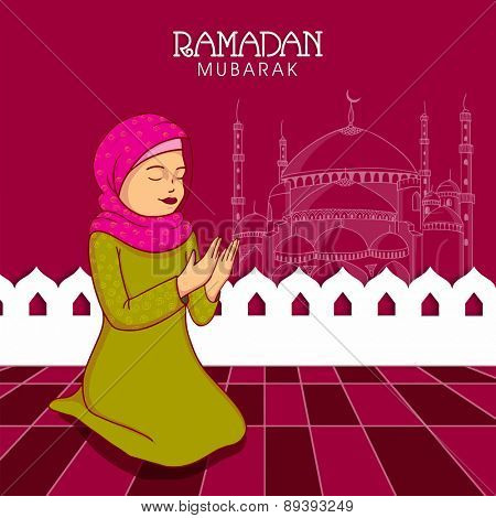 Young Muslim lady in hijab praying (reading Namaz, Islamic Prayer) on Mosque decorated background for holy month Ramadan Kareem celebration.