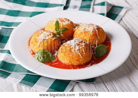 Fried Arancini Rice Balls With Tomato Sauce On The Table. Horizontal