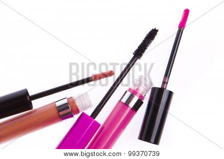 set of lip glosses isolated on white background